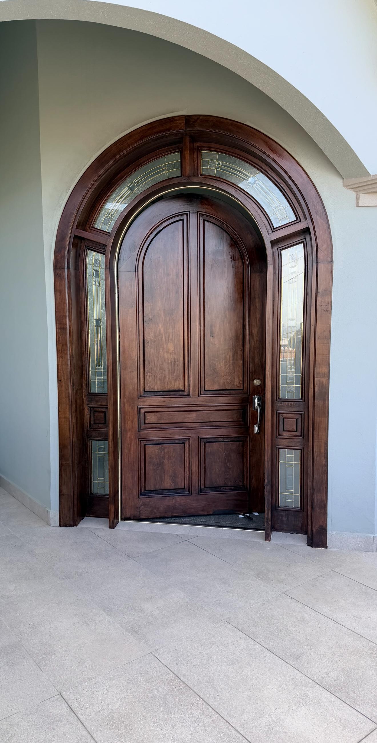 Custom solid wood arched entry door